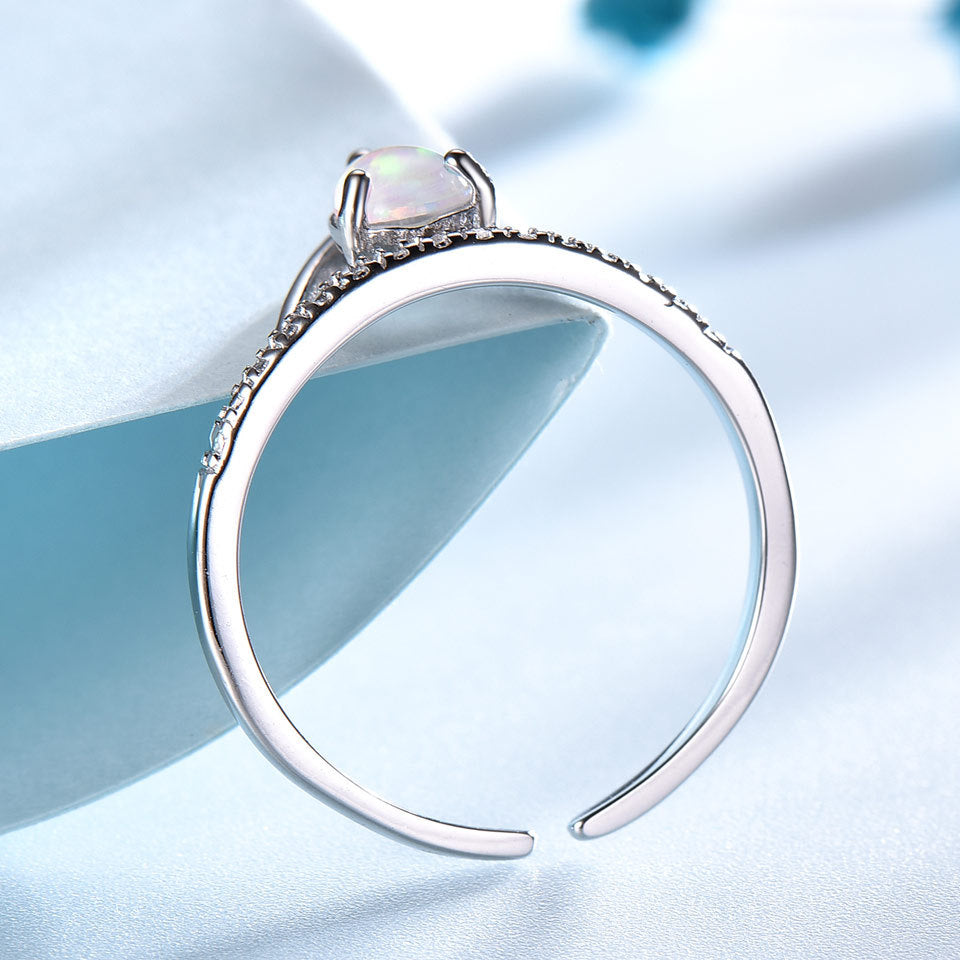 White gemstone adjustment ring